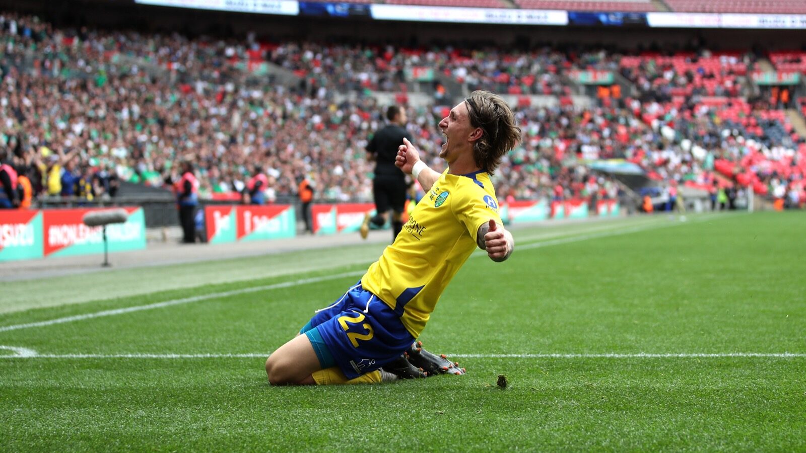 Kai Walters gets the knee slide in, in the FA Vase Final. Photo: Neil Graham.