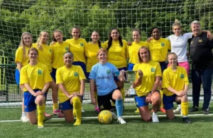 Ascot United Phoenix squad with TVCWFL Division One trophy