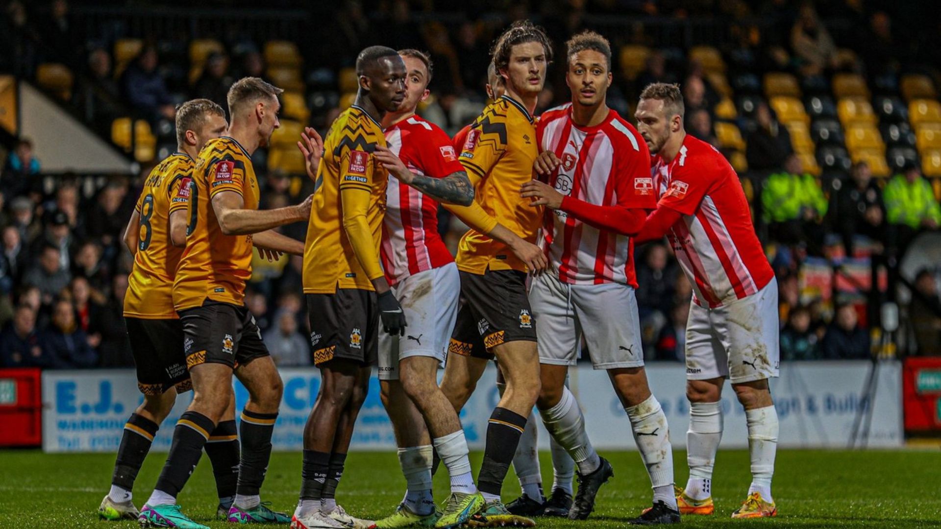 Bracknell Town players prepare for a corner against Cambridge United. Photo: John Leakey.