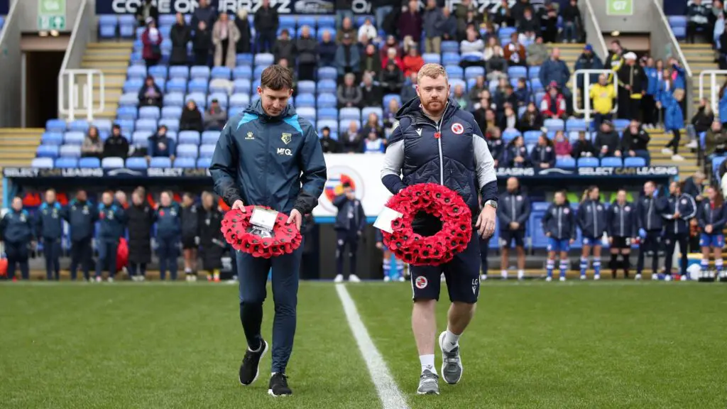 Reading FC Women manager Liam Gilbert with a commemorative wreath. Photo: Neil Graham.
