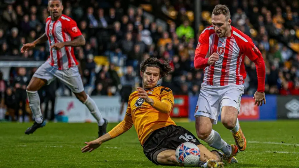 What might have been - Ben Harris is fouled in the penalty box. Photo: John Leakey.