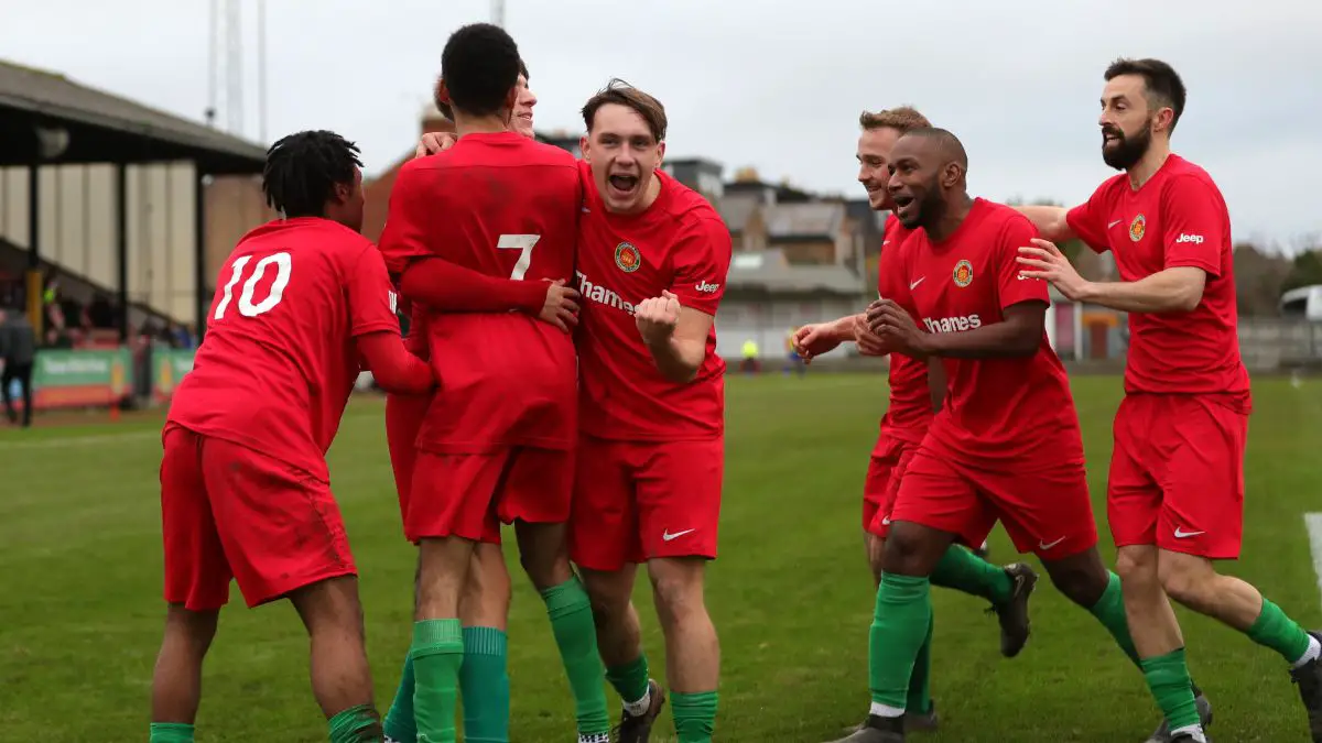 Ashley Howes engulfed by his Windsor & Eton team mates. Photo: Richard Milam.