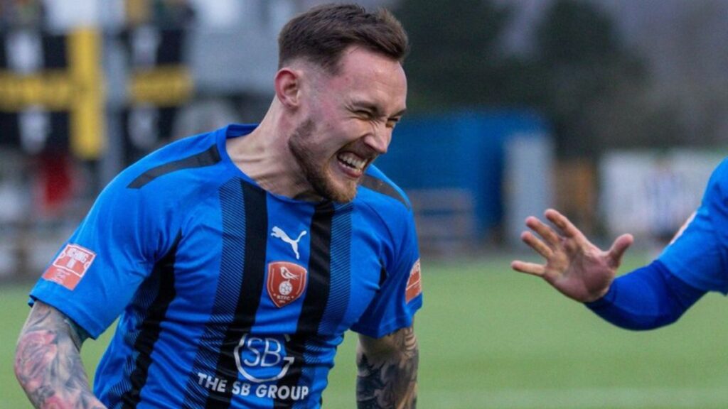 Joe Grant celebrates scoring at Merthyr Town. Photo: John Leakey.