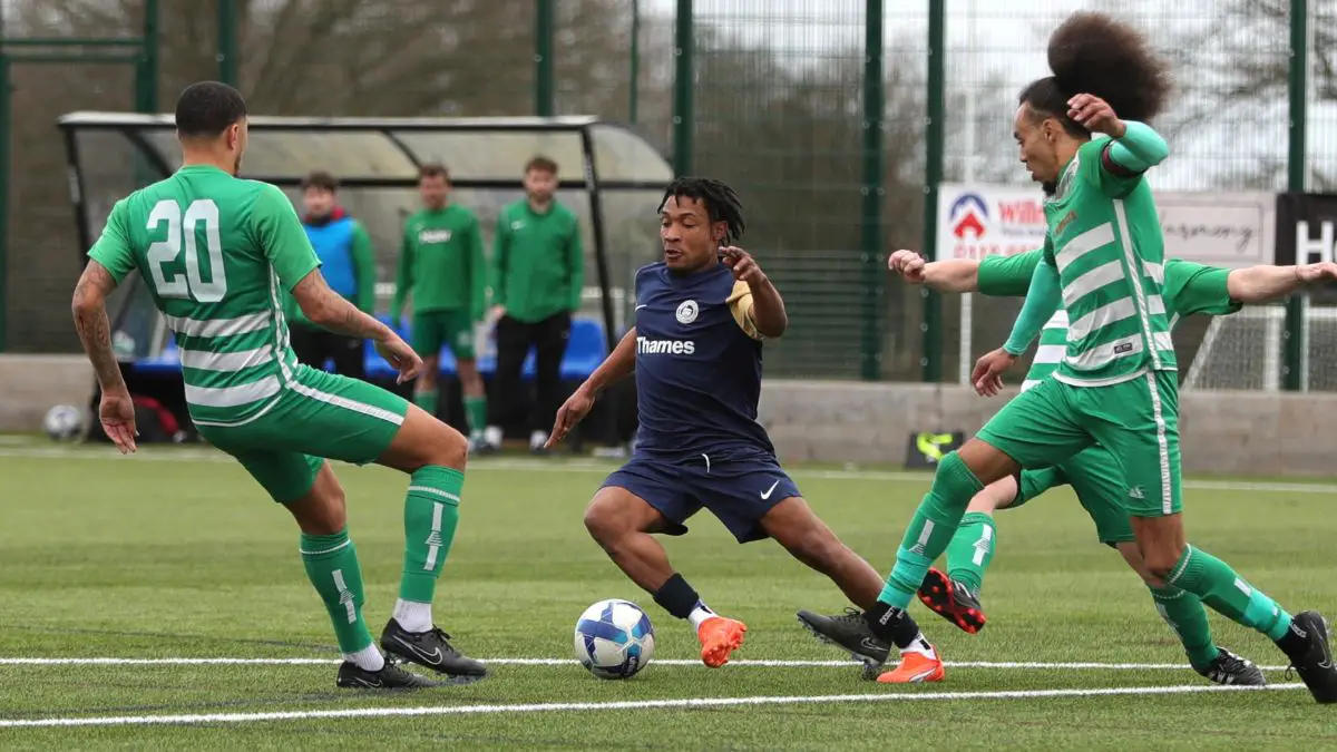 Fiifi Carter tries to find a way through the Westwood Wanderers defence. Photo: Richard Milam.