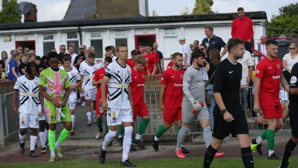 Windsor & Eton and Windsor head out onto the Stag Meadow pitch. Photo: Richard Milam.