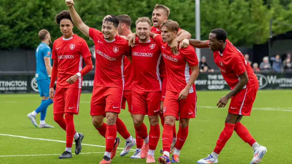 Bracknell Town celebrate Ethan Burden's late equaliser. Photo: John Leakey.