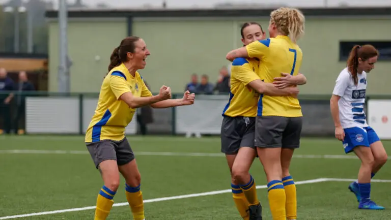 Woodley United celebrate winning in the Adobe Women's FA Cup (Andy Wicks)