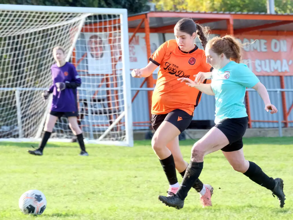 Caitlin Ryan and Wokingham's Caitlin Taylor. Photo: Andrew Batt.