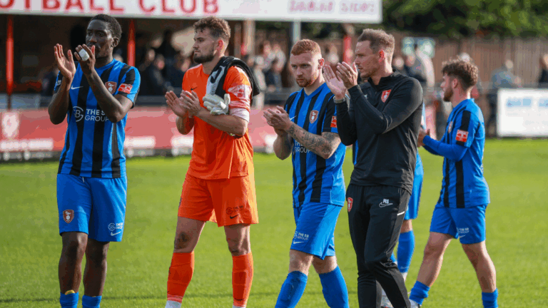 Bracknell Town players applaud supporters at the end of their FA Cup tie. Photo: John Leakey.