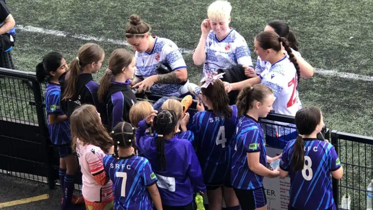 Reading FC Women sign autographs after the game on Sunday. Photo: Abi Ticehurst.