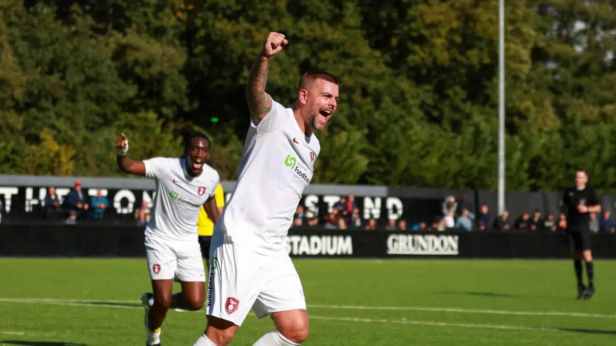 Sam Magri celebrates scoring for Bracknell Town. Photo: John Leakey.