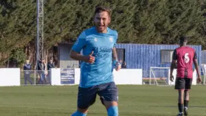 Harvey Collins scores for Woodley United. Photo: Trevor Smith / Instagram @trevsphotos1