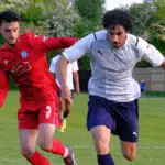 Action from FC Bapco vs Burghfield. Photo: Andrew Batt.