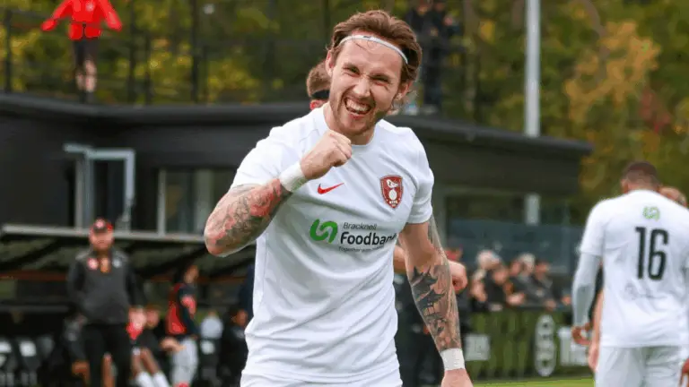 Joe Grant celebrates scoring for Bracknell Town. Photo: John Leakey.