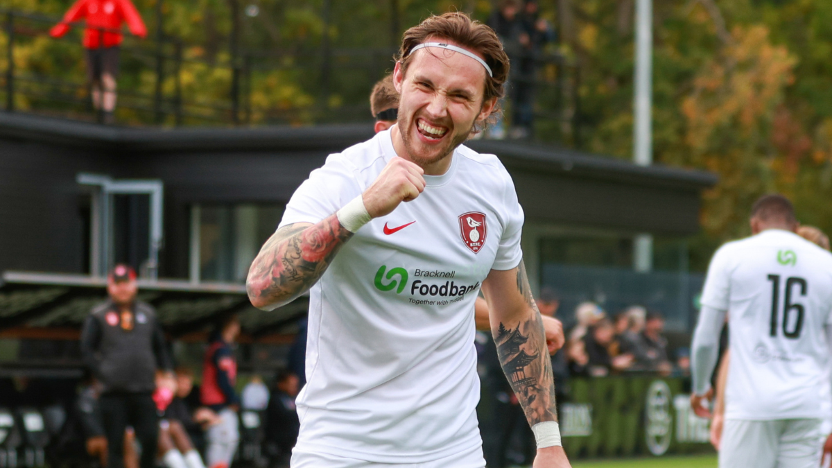 Joe Grant celebrates scoring for Bracknell Town. Photo: John Leakey.