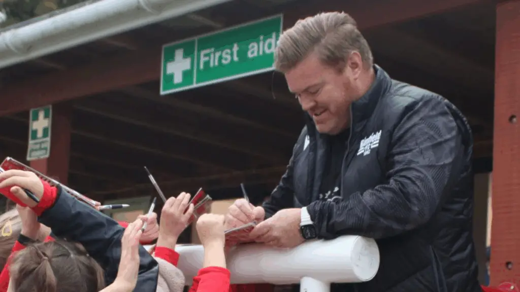 Ross Weatherstone signs autographs. Photo: Binfield FC.
