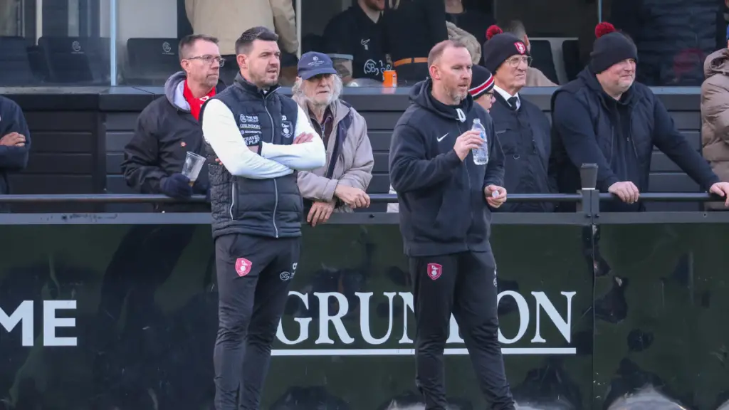 Carl Davies and Sean Miles in the Bracknell Town dugout. Photo: John Leakey.