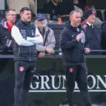 Carl Davies and Sean Miles in the Bracknell Town dugout. Photo: John Leakey.