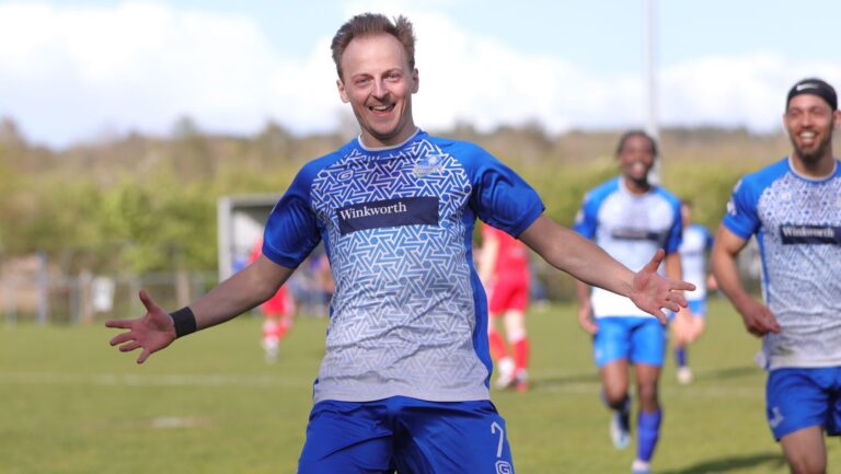 Ollie Noyes celebrates scoring a goal that keeps Eversley & California at Step 5. Photo: Richard Milam.