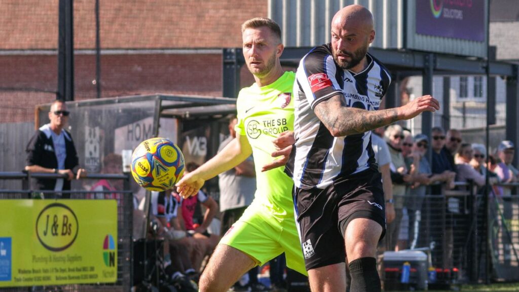 Jack Mazzone (yellow) in action for Bracknell Town. Photo: John Leakey.