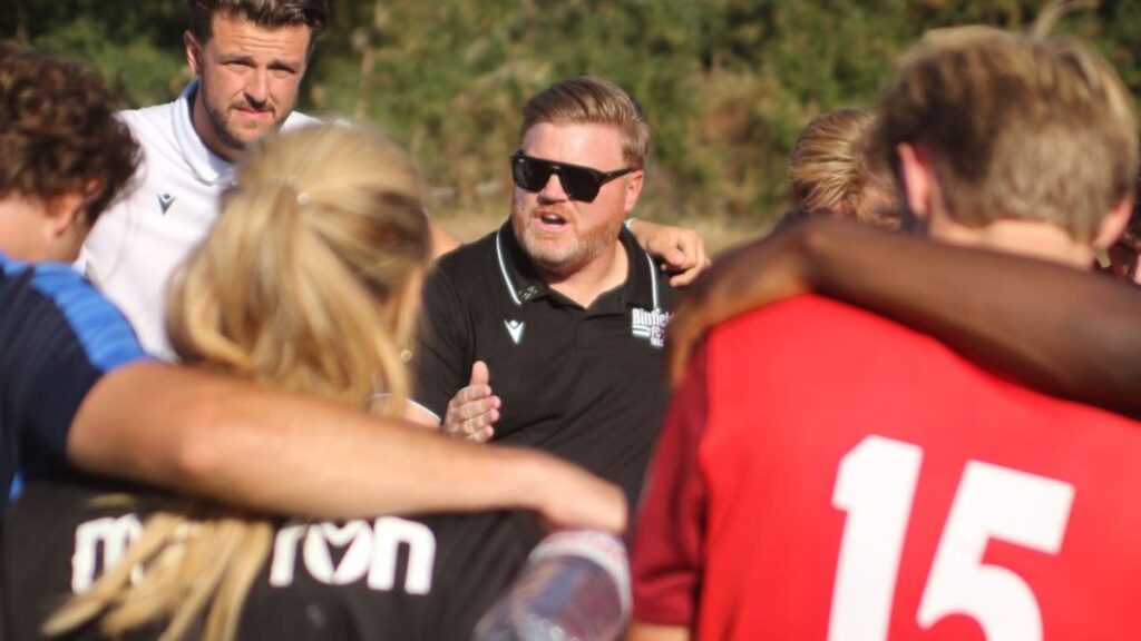 Binfield manager Ross Weatherstone speaks to his players. Photo: Binfield FC.