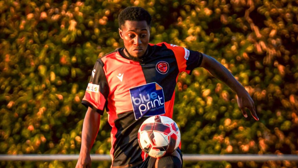 Kieran Dowding on the ball for Wokingham Town. Photo: Danny Byrne.
