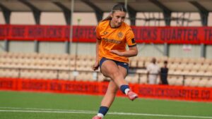 Amber Saunders converts her penalty. Photo: Cameron Webb.