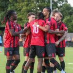 Bracknell Town players celebrate. Photo: John Leakey.