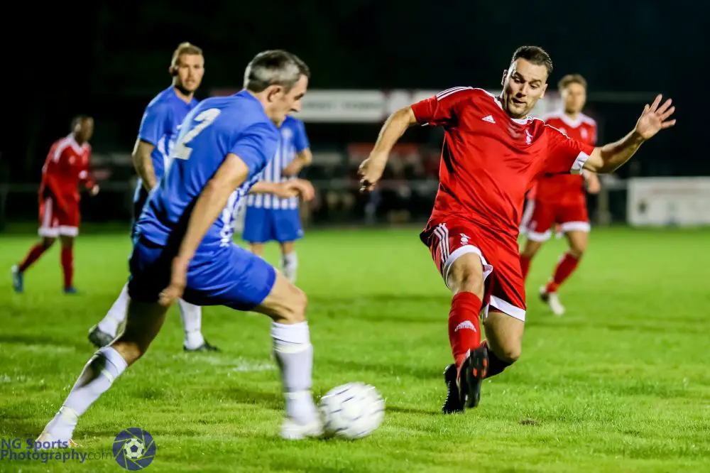 Adam Cornell closes down for Bracknell Town FC against Thatcham Town FC. Photo: Neil Graham.