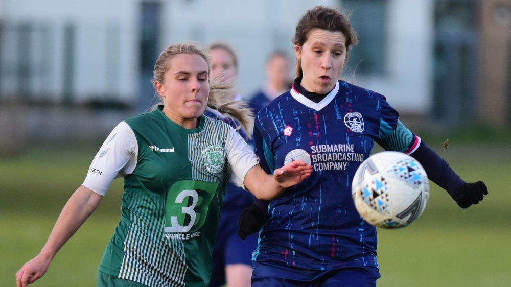 Megan Brockwell (left and Ashton Downey (right) challenge for the ball in the Caversham United vs Long Crendon fixture. Photo: Rob Mellor.