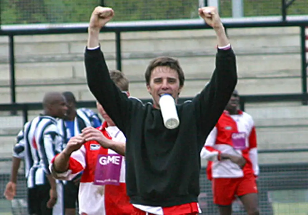 Gavin Smith celebrates after Bracknell Town's win at Tooting & Mitcham United in 2003. Photo: Richard Claypole.