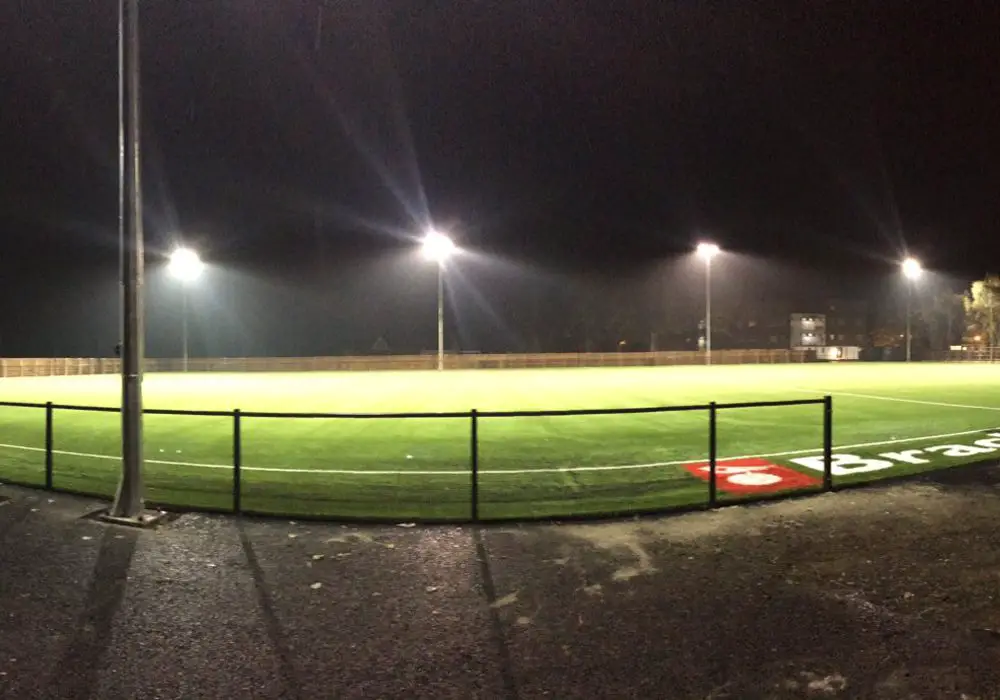 The floodlights are on at Bracknell Town's Larges Lane ground. Photo: Kayne Steinborn-Busse.