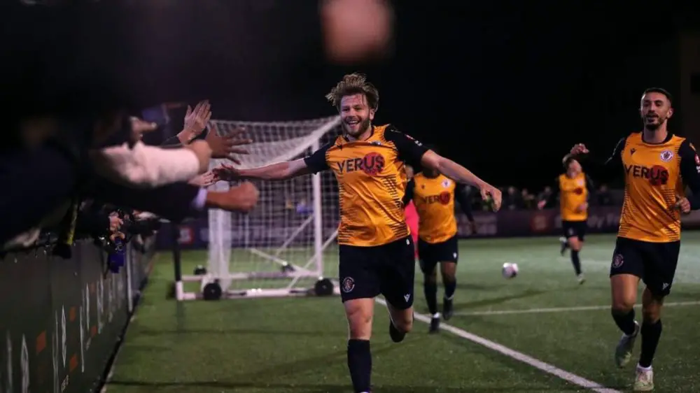 Matty Lench arms wide in the FA Cup for Slough Town. Photo: Neil Graham.