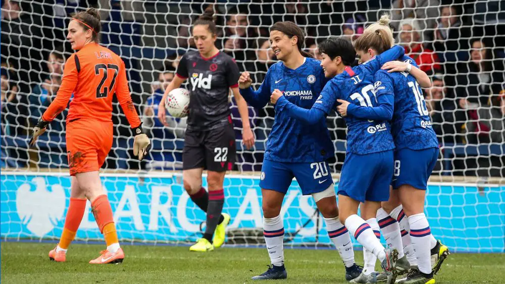 Sam Kerr celebrates with her Chelsea team mates. Photo: Neil Graham / ngsportsphotography.com