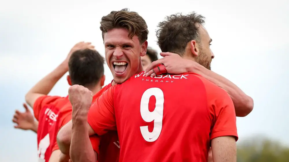 Sean Moore celebrates his goal for Binfield in the FA Vase. Photo: Neil Graham / ngsportsphotography.com
