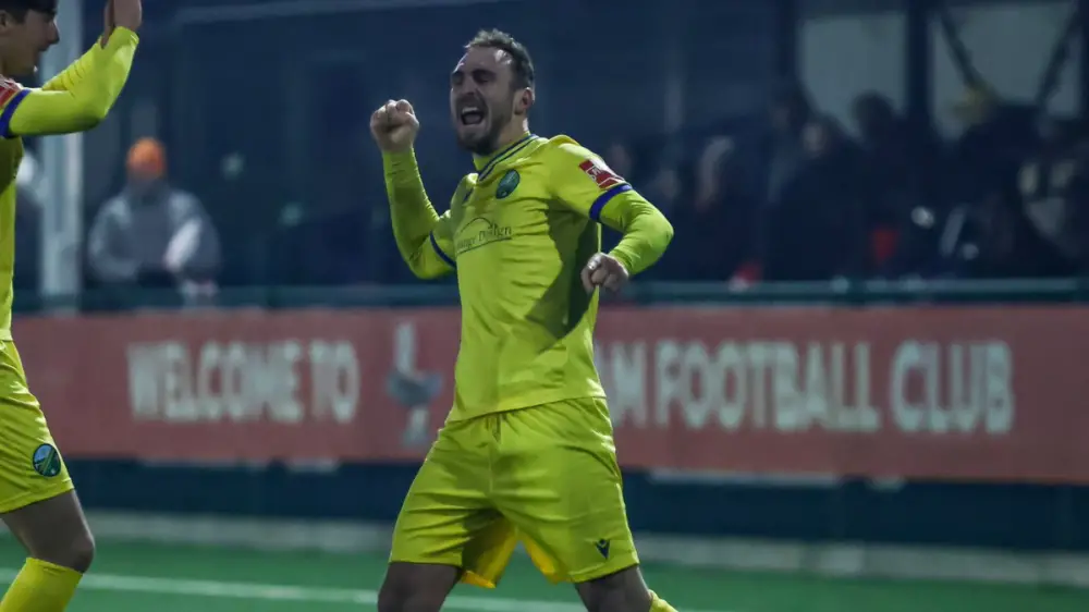 Ben Harris celebrates a goal for Ascot United. Photo: Robert Mack.